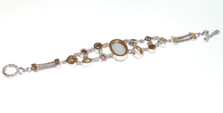 Einzelstück, Armband aus 925 Silber mit 11 pastellfarbenen Edelsteinen in verschiedenen Schliffformen, angeordnet in 2 Reihen mit einem Mittelstein, Amethyst, Citrin, Quarzkristall + Olivin, Knebelverschluß, Länge 19 cm -	Einzelstücke nur erhältlich bei www.danilogold-shop.d
