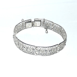 Retro Einzelstück, Vintage Filigran-Glieder-Armband aus 835 Silber, 19,5 cm lang mit 7 filigranen, rechteckige, floralen Elementen, durch die langen dem Arm angepaßt gebogenen Elementen liegt es fast wie ein Armreif, paßt sich aber dem Handgelenk an, poliert, um 1930, Kastenschloß, Sicherheitskette -	Nur erhältlich im Onlineshop von Juwelier & Goldschmiede Danilo!