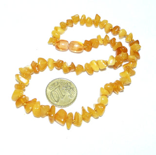 Einzelstück, Baby-Bernstein-Kette, polierte Splitter, durchgeknotet, hell-honiggelb Butterscotch, Dreh-Verschluß aus Kunststoff, Gesamtlänge 33 cm, kann beim Zahnen helfen -	Einzelstücke nur erhältlich bei www.danilogold-shop.de