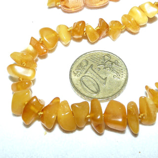 Einzelstück, Baby-Bernstein-Kette, polierte Splitter, durchgeknotet, hell-honiggelb Butterscotch, Dreh-Verschluß aus Kunststoff, Gesamtlänge 33 cm, kann beim Zahnen helfen -	Einzelstücke nur erhältlich bei www.danilogold-shop.de