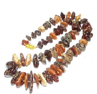 handgefädeltes Einzelstück, mehrfarbige Unikat-Bernstein-Kette, handgefertigt aus Natur-Bernstein-Nuggets, ungeknotet mit Mini-Kügelchen zwischen den Scheiben, honig-braun / beige / cognacfarben, im Verlauf aufgereiht mit einem Dreh-Verschluß aus Kunststoff, Gesamtlänge 65 cm -	Einzelstücke nur erhältlich bei www.danilogold-shop.de