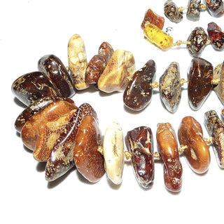handgefädeltes Einzelstück, mehrfarbige Unikat-Bernstein-Kette, handgefertigt aus Natur-Bernstein-Nuggets, ungeknotet mit Mini-Kügelchen zwischen den Scheiben, honig-braun / beige / cognacfarben, im Verlauf aufgereiht mit einem Dreh-Verschluß aus Kunststoff, Gesamtlänge 65 cm -	Einzelstücke nur erhältlich bei www.danilogold-shop.de