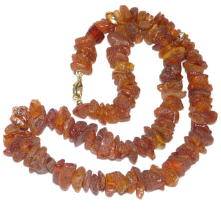 handgefädeltes Einzelstück, Bernstein-Kette aus leicht anpolierten Natur-Nuggets, im Verlauf ungeknotet, dunkleres Cognac-orange, Verschluß aus Gold-Doublé, Gesamtlänge 50 cm -	Einzelstücke nur erhältlich bei www.danilogold-shop.de