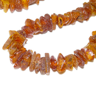 handgefädeltes Einzelstück, Bernstein-Kette aus leicht anpolierten Natur-Nuggets, im Verlauf ungeknotet, dunkleres Cognac-orange, Verschluß aus Gold-Doublé, Gesamtlänge 50 cm -	Einzelstücke nur erhältlich bei www.danilogold-shop.de