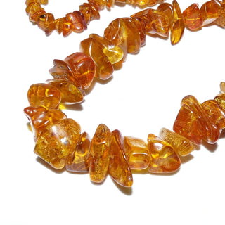 handgefädeltes Einzelstück, Bernstein-Kette aus polierten großen Splittern / Chips, im Verlauf ungeknotet aufgereiht, honigfarbenes Cognac-orange, ohne Verschluß, Gesamtlänge 70 cm -	Unikate und Pretiosen nur erhältlich im Onlineshop der Goldschmiede Danilo!