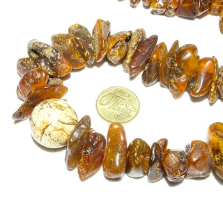 in unserer Werkstatt gestaltetes Unikat, Bernstein-Kette aus honig-braunen leicht polierten Natur-Nuggets, ungeknotet, als Mittelteil eine Landschafts-Jaspis-Kugel, Verschluß aus Gold-Doublé, Gesamtlänge 50 cm -	Handgefertigtes Unikat! Nur im Onlineshop von Juwelier & Goldschmiede Danilo!
