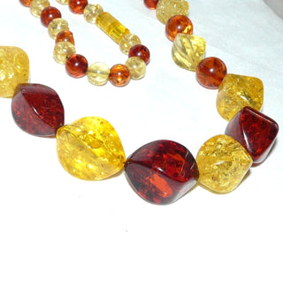 Einzelstück, opulente, mehrfarbige, handgefertigte Bernstein-Kette aus großen polierten, angeschliffenen Oliven + zum Ende hin kleineren Kugeln im Verlauf, ungeknotet, in warmen honig-rotbraun + strahlendem hellgelb, schöne, funkelnde Einschlüsse, Dreh-Verschluß, Gesamtlänge 62 cm -	Handgefertigtes Unikat! Nur im Onlineshop von Juwelier & Goldschmiede Danilo!