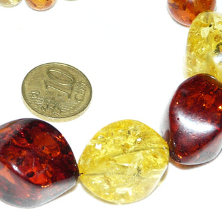 Einzelstück, opulente, mehrfarbige, handgefertigte Bernstein-Kette aus großen polierten, angeschliffenen Oliven + zum Ende hin kleineren Kugeln im Verlauf, ungeknotet, in warmen honig-rotbraun + strahlendem hellgelb, schöne, funkelnde Einschlüsse, Dreh-Verschluß, Gesamtlänge 62 cm -	Handgefertigtes Unikat! Nur im Onlineshop von Juwelier & Goldschmiede Danilo!