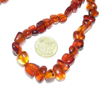 handgeschliffenes Einzelstück, Bernstein-Kette aus polierten, unregelmäßige, Nuggets im Verlauf ungeknotet aufgereiht, mit dezenten Einschlüsse in dunklerem Cognac-orange, Verschluß aus Gold-Doublé, Gesamtlänge 50 cm -	Unikatschmuck nur erhältlich im Onlineshop von Juwelier & Goldschmiede Danilo! 
