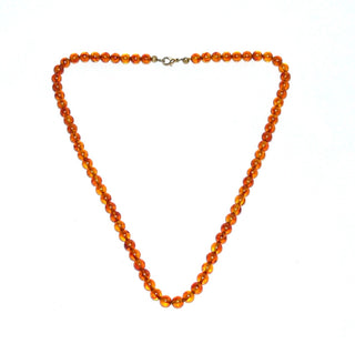 Einzelstück, Bernstein-Kugel-Kette aus polierten Kugel in einem mittleren Cognac-orange, gleichlaufend, feine dezente Einschlüsse, ungeknotet, Verschluß aus Gold-Doublé, Gesamtlänge 45 cm -	Nur erhältlich im Onlineshop von Juwelier & Goldschmiede Danilo!