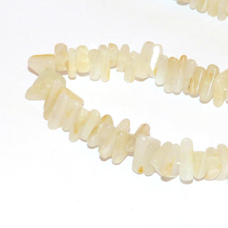 gelbes Einzelstück, Jadecollier, gelbe Lemonjade in Dreiecken geschliffen mit einer Seitenlänge von ca. 12mm, Länge 50cm, Drehverschluß aus Gelbmetall, auf Faden aufgezogen - Goldschmiede Danilo