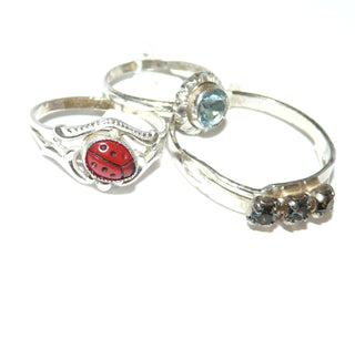 Einzelstücke, Kinder-Silberringe, 3-teiliges Ring-Set mit Marienkäfer RW 47, hellblauem Zirkonia RW 42 + 3 braune facettierte Rauchquarz-Repliken RW 59 - Goldschmiede Danilo