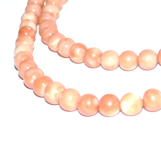 lachsrosa Einzelstück, Engelshautkoralle, Kette aus natürlicher Koralle mit rosa-weißer Marmorierung, Kugeln Durchmesser 6 mm, Länge 49cm, 925 Silber-Federring, auf Stahlseide -&nbsp; Goldschmiede Danilo