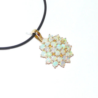 Einzelstück, "Opal-Stern", runder Opal-Anhänger mit 31 blau-grün schillernden äthiopischen Opalen, aus massiv 585 Gold, Clipöse auch für Edelstein + Perlenketten, Krappenfassungen in Rosettenform -	Nur erhältlich im Onlineshop von Juwelier & Goldschmiede Danilo!