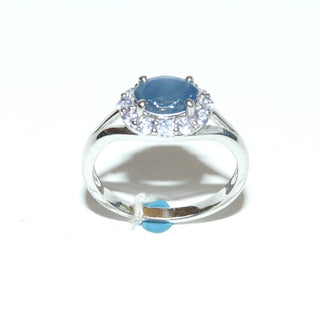 Einzelstück, klassischer Ring im Juwelenstil aus 925 Silber mit einem ovalen, facettierten Tansanit sicher eingefaßt in einem 4-Krapper-Chaton. Rundherum12 runde, facettierte Iolithe / Wassersaphire, quer zum Finger, poliert, Ringweite 59,5 -	Unikatschmuck nur erhältlich im Onlineshop von Juwelier & Goldschmiede Danilo! 