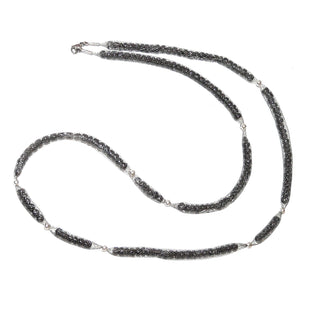 Einzelstück, Unikat-Collier "Gummisilber schwarze Flachkugeln" aus 925 Silber, Gummisilber (ein fein gewebter flexibler Schlauch aus hauchdünnen Silberfäden) mit innenliegenden schwarzen Flachkugeln mit polierten Kugeln symmetrisch unterteilt, 64 cm lang -	Unikate und Pretiosen nur erhältlich im Onlineshop der Goldschmiede Danilo!