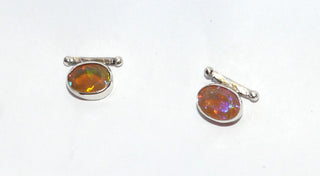 Einzelstücke, Handarbeit, Ohrstecker aus 925 Silber mit herrlich schillernden, ovalen äthiopischen Welo-Opal, Farbe "Feueropal" dunkles Orangen mit violetten und grünen Facetten, 11,8 mm x 8,5 mm - Handarbeiten online bestellen bei Juwelier & Goldschmiede Danilo!