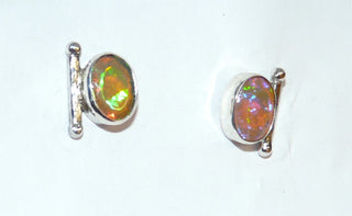 Einzelstücke, Handarbeit, Ohrstecker aus 925 Silber mit herrlich schillernden, ovalen äthiopischen Welo-Opal, Farbe "Feueropal" dunkles Orangen mit violetten und grünen Facetten, 11,8 mm x 8,5 mm - Handarbeiten online bestellen bei Juwelier & Goldschmiede Danilo!