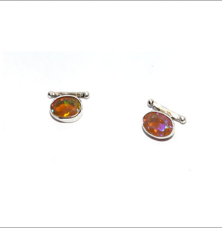 Einzelstücke, Handarbeit, Ohrstecker aus 925 Silber mit herrlich schillernden, ovalen äthiopischen Welo-Opal, Farbe "Feueropal" dunkles Orangen mit violetten und grünen Facetten, 11,8 mm x 8,5 mm - Handarbeiten online bestellen bei Juwelier & Goldschmiede Danilo!
