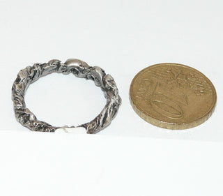 Handgefertigtes Einzelstück, Trauring, Ring "Stanniol" aus 925 Silber, asymmetrisch gearbeitet mit einem facettierten Zirkonia in Navette-Form, gleichlaufend, seidenmatt + in den Tiefen geschwärzt, Ringweite 56,5, dazu paßt Ri 0380 -	Handgefertigtes Unikat! Nur im Onlineshop von Juwelier & Goldschmiede Danilo!