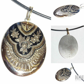 Einzelstück, angenehm flacher Vintage-Anhänger aus 585 Gelbgold, umgearbeitet aus dem Oberteil eines alten Biedermeier-Medaillons mit einem Boden aus 925 Silber, schwarzes Emaille umschließt das florale Muster, Gesamtmaße ca. 40,5 mm x 15 mm mit Schlaufe (Lieferung erfolgt ohne Kette) -	Vintage-Schmuck nur im Onlineshop von danilogold!