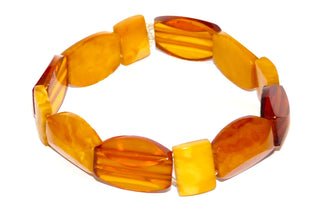 Einzelstück, Vintage-Armband aus cognacfarbenem + gelbem alten Bernstein aus großen + kleinen Rechteckten, flexibler Gummizug, Innenumfang ca. 18,5 cm -	Nur erhältlich im Onlineshop von Juwelier & Goldschmiede Danilo!