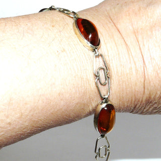 Vintage-Einzelstück, Bernsteinarmband aus 830 Silber mit transparentem honigfarbenen Bernstein in langovalen Cabochons, klar, fast ohne Einschlüsse, Länge 20cm, Federringverschluß, Art Deco 1930-1935 - Goldschmiede Danilo