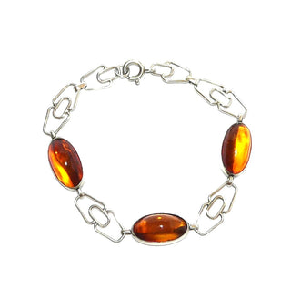 Vintage-Einzelstück, Bernsteinarmband aus 830 Silber mit transparentem honigfarbenen Bernstein in langovalen Cabochons, klar, fast ohne Einschlüsse, Länge 20cm, Federringverschluß, Art Deco 1930-1935 - Goldschmiede Danilo