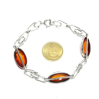 Vintage-Einzelstück, Bernsteinarmband aus 830 Silber mit transparentem honigfarbenen Bernstein in langovalen Cabochons, klar, fast ohne Einschlüsse, Länge 20cm, Federringverschluß, Art Deco 1930-1935 - Goldschmiede Danilo