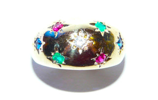 Einzelstück, Bandring aus 925 Silber, Ringoberteil vergoldet, farbige Synthesen in Rubinrot, Saphirblau + Smaragdgrün, jeweils im Stern verschnitten, Ringweite 53
-	Nur erhältlich bei www.danilogold-shop.de
