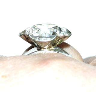 Einzelstück, Antragsring, Vintage-Bergkristall-Ring "Kronenblüte", Design Karl Erik Palmberg/ Schweden, aus 925 Silber mit einer Blüten-Fassung in der ein großer, runder, facettierter Bergkristall eingefaßt ist, poliert, Ringweite verstellbar bis ca. 60, um 1970 (Kennen Sie Ihre Ringweite? Dann geben Sie diese bei der Bestellung an, und wir stellen diese Weite vorab für Sie ein!) -	Unikate und Pretiosen nur erhältlich im Onlineshop der Goldschmiede Danilo!