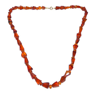 handgefertigtes Einzelstück, antike Vintage-Bernstein-Kette aus polierten Triangel + Linsen, im Verlauf ungeknotet aufgereiht, in mittlerem Rotbraun, Verschluß aus Gold-Doublé, Gesamtlänge 50 cm, um 1930 -	Handarbeiten online bestellen bei Juwelier & Goldschmiede Danilo!