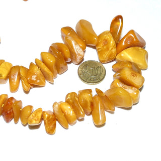 antikes Einzelstück, handgefertigte Vintage-Bernstein-Kette aus polierten großen Splitter-Nuggets im Verlauf, durchgeknotet, helles honigfarbenes Butterscotch, Verschluß aus Gold-Doublé, Gesamtlänge 67 cm, um 1930 -	Handgefertigtes Unikat! Nur im Danilo Gold Online Shop!