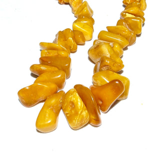 antikes Einzelstück, handgefertigte Vintage-Bernstein-Kette aus polierten großen Splitter-Nuggets im Verlauf, durchgeknotet, helles honigfarbenes Butterscotch, Verschluß aus Gold-Doublé, Gesamtlänge 67 cm, um 1930 -	Handgefertigtes Unikat! Nur im Danilo Gold Online Shop!