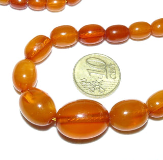 antikes Einzelstück, handgeschliffene Vintage-Bernstein-Kette aus polierte Oliven im Verlauf von 6 mm auf 15 mm Durchmesser, Art-Deco, ungeknotet, honiggelber Butterscotch, originaler Bernstein-Dreh-Verschluß, Gesamtlänge 48 cm -	Vintage-Schmuck nur im Onlineshop von danilogold!