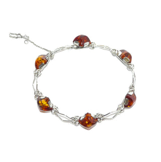 Vintage-Einzelstück, Bernsteinarmband aus 830 Silber mit quadratischen, transparenten, honigbraunen Bernstein-Cabochons mit schönen Einschlüssen, Krappenfassungen, leichte Drahtrauten dazwischen, 19,5cm mit verdecktem Hakenverschluß, DDR VEB Fischland-Schmuck um 1970 - Goldschmiede Danilo