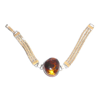 Vintage-Einzelstücke, Bernsteinarmband aus 925 Silber mit einem transparenten honigbraunen leicht ovalen Cabochon mit schönen Linseneinschlüssen in Zargenfassung, 17,5cm lang, Hakenverschluß, Polnisch modernistischer Ostsee-Stil Danzig Ende 1980-er Jahre - Goldschmiede Danilo