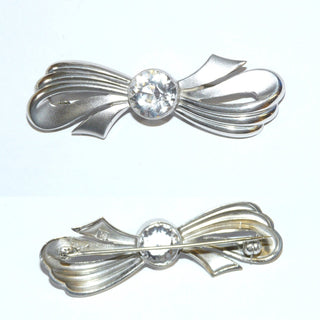 Einzelstück, alte gestanzte Brosche in Schleifenform, Bergkristall mit Zargenfassung und Millesgriffes-Rand, Länge ca. 57 mm, 835 Silber, Deutschland um 1940- Nur erhältlich bei www.danilogold-shop.de