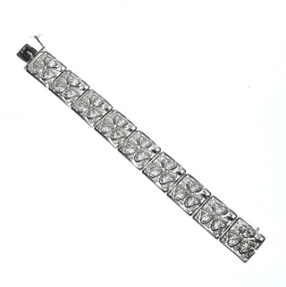 Einzelstück, Vintage-Filigran-Armband, Glieder-Armband aus 800 Silber, historischer Trachten- & Gesellschaftsschmuck, 19 cm lang, 7 filigrane, leicht aufgewölbte, quadratische Blumen-Elemente mit Kleeblatt-Motiv in Filigran-Technik gearbeitet, liegt eher wie ein Armreif, poliert, Art Deco um 1930, Kastenschloß, Sicherheitsacht