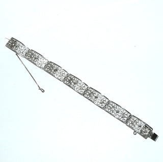 Retro Einzelstück, Vintage Filigran-Glieder-Armband aus 835 Silber, 19,5 cm lang mit 7 filigranen, rechteckige, floralen Elementen, durch die langen dem Arm angepaßt gebogenen Elementen liegt es fast wie ein Armreif, paßt sich aber dem Handgelenk an, poliert, um 1950, Kastenschloß, Sicherheitskette -	Nur erhältlich im Onlineshop von Juwelier & Goldschmiede Danilo!