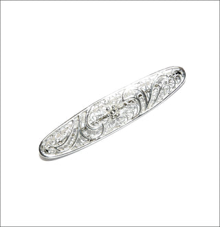 antikes Einzelstück, langgezogene Filigran-Brosche aus 835 Silber, floral anmutende Ornamente mit schmalen, polierten Bögen durchzogen und Kügelchen-Blüte im Zentrum, ca. 50 mm x 11 mm, um 1940 - Nur erhältlich im Onlineshop von Juwelier & Goldschmiede Danilo!