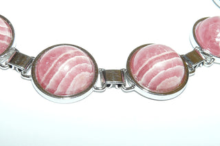 Einzelstück, Vintage-Glieder-Armband aus Silber,18 cm lang, mit 6 runden, rosa-weiß gemaserten Rhodochrosit-Cabochons, um 1960, Klappverschluß -	Nur erhältlich im Onlineshop von Juwelier & Goldschmiede Danilo!