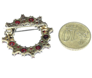 antikes Einzelstück, Vintage-Granat-Brosche aus "Norm-Gold" (niedriger als 333), funkelnd facettierte Granate in schöner Farbe "Böhmisches Feuer" im Rosenschliff, als offener Stern-Kreis gearbeitet, Kugelsicherung, um 1920 -	Vintage-Schmuck nur im Onlineshop von danilogold!