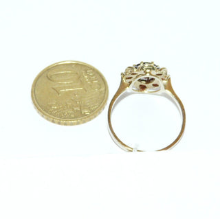 Vintage-Einzelstück, Granatring aus 333 Gold, 1 breitovaler & 8 kleine runde, facettierte, handgeschliffene Bömische Granate im Altschliff bilden eine ovale Rosette, Arkadenfassung, Krappenfassungen, Ringweite 54,5, spätes Art Deco Deutsche Manufakturarbeit Wemo um 1935 - Goldschmiede Danilo