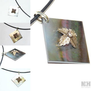 Einzelstück, Vintage Mariage-Anhänger aus 585 Gelbgold auf einer grauen, schillernden Perlmutt-Platte, Mittelstück mit einer kleinen Perle um 1900 -	Nur erhältlich im Onlineshop von Juwelier & Goldschmiede Danilo!