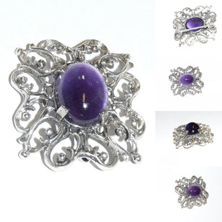 historisierende Silberbrosche, um 1950, Amethyst-Cabochon gefaßt in 925 Silber, filigranes Muster aus "Kügelchen &  Ranken", ca. 35 mm x 32 mm -	Goldschmiede Danilo!