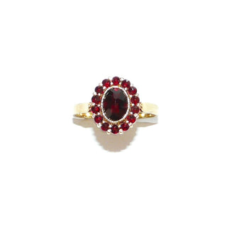 Vintage-Einzelstück, antiker Granatring aus 375 Gold mit einem ovalen & 14 kleinen runden Böhmischen Granaten, alle im Sternschliff, England Manufaktur G.H.Johnstone & Co. Birmingham, ovale Rosette aus Krappen- & einer Zargenfassung mit Millesgriffes-Rand, Ringweite 59,5, Edwardiansche Epoche 1905-25 - Goldschmiede Danilo