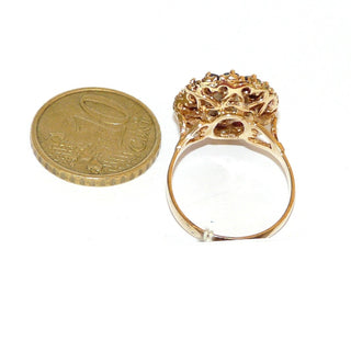 antikes Einzelstück, Granatring aus 585 Gold mit einem kleineren ovalen & 14 kleinen runden, facettierten Granaten im Altschliff, ovale Rosette, bestehend aus konzentrischen Ringen: floraler Goldring, Granatring, facettierte Platte & in der Mitte der ovale Stein, Krappenfassungen, Ringweite 55,5, Gründerzeit 1870-1890 - Goldschmiede Danilo