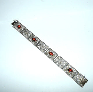antikes Einzelstück, breites Vintage-Filigran-Armband, Glieder-Armband aus 835 Silber mit 4 ovalen, bernsteinfarbenen, facettierten Repliken an klaren Bernstein oder Padparadscha-Saphire erinnernd, Gesamtlänge 19 cm lang, wirkt am Arm eher wie ein Armreif, 8 filigrane, rechteckige Blumen-Elemente, poliert, um 1940, sicheres Kastenschloß - Vintage-Schmuck nur im Onlineshop von danilogold!
