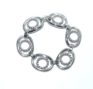 dekoratives Einzelstück, Vintage-Glieder-Armband, Design Katja Lührs, Lübeck aus massivem 835 Silber, poliert, 19 cm lang, 6 ovale, durchbrochene Elemente auf denen sich runde Kordel-Elemente befinden, Schlaufenverbindungen, Sicherheitsacht, um 1960 - Vintage-Schmuck nur im Onlineshop von danilogold!